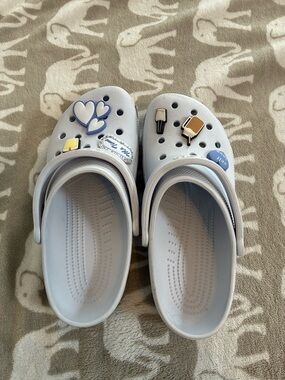 CROCS Light Blue Slip-On Clogs with Decorative Charms